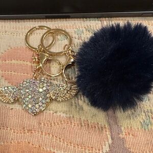 Gold and Black Heart Wing Keychain with Pom Pom